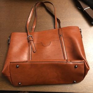 Brown leather tote with matching wristlet